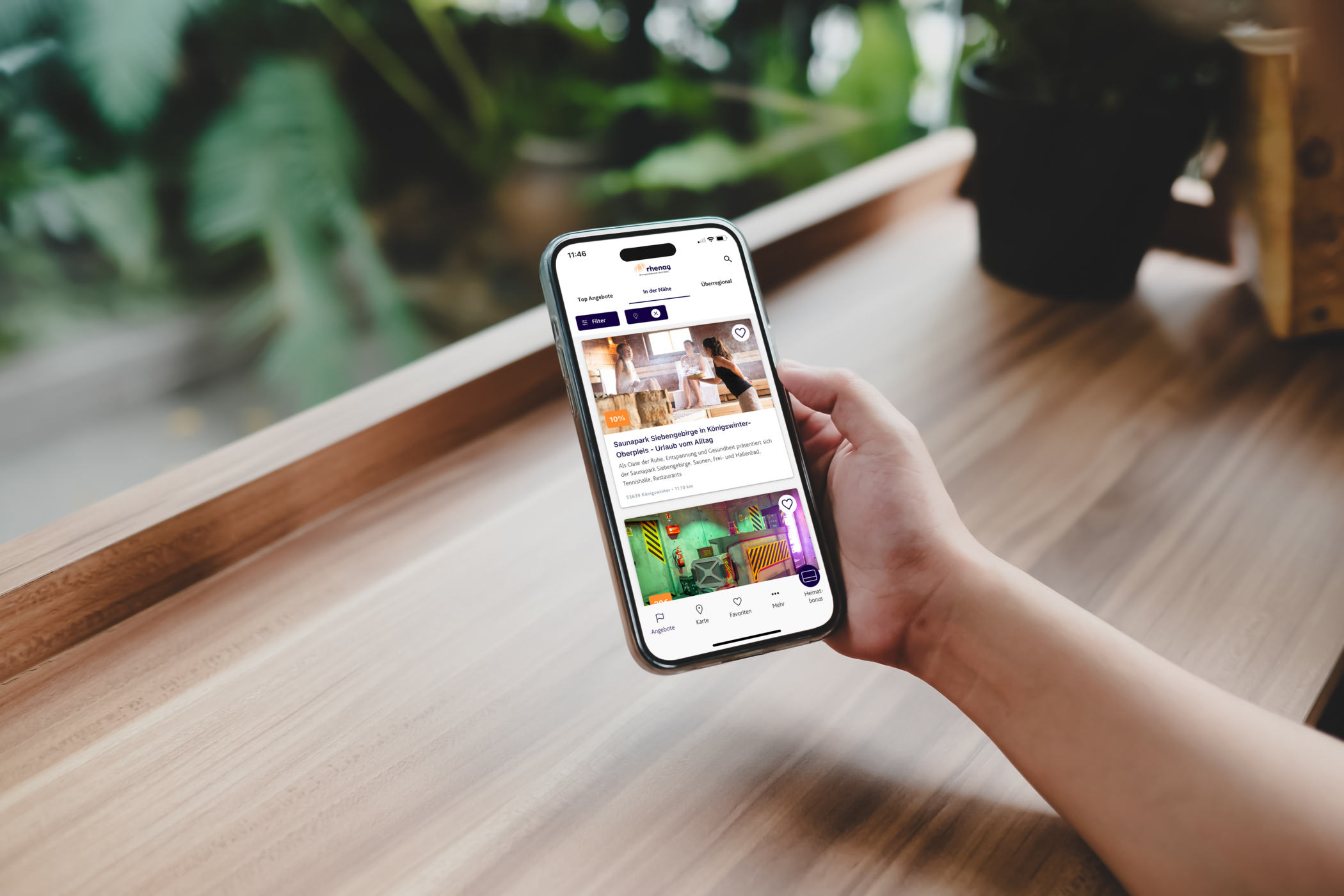 rhenag Heimatbonus App offen auf einem Smartphone